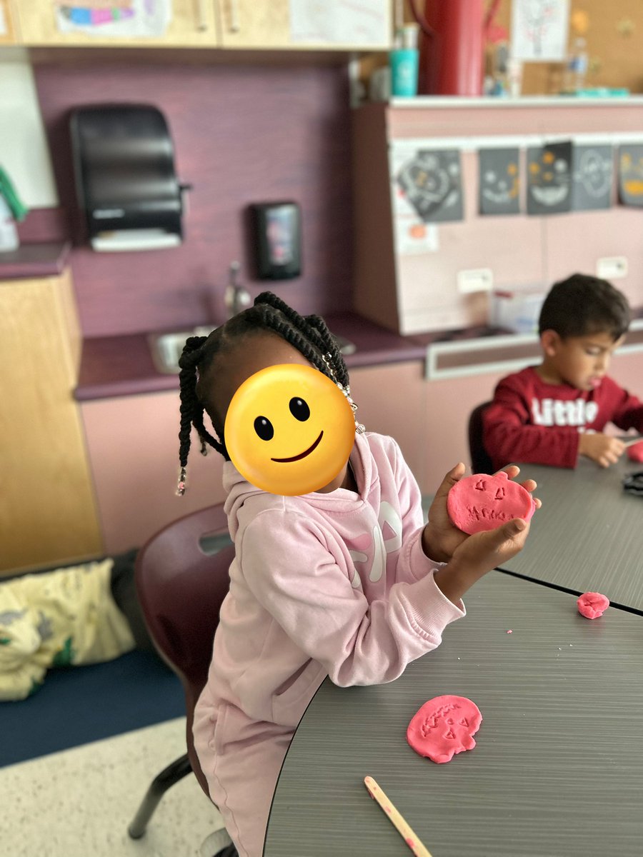 All about pumpkins! Today we cut open one of our pumpkins and began to explore the inside. There was lots of estimating, counting, and Playdoh faces!