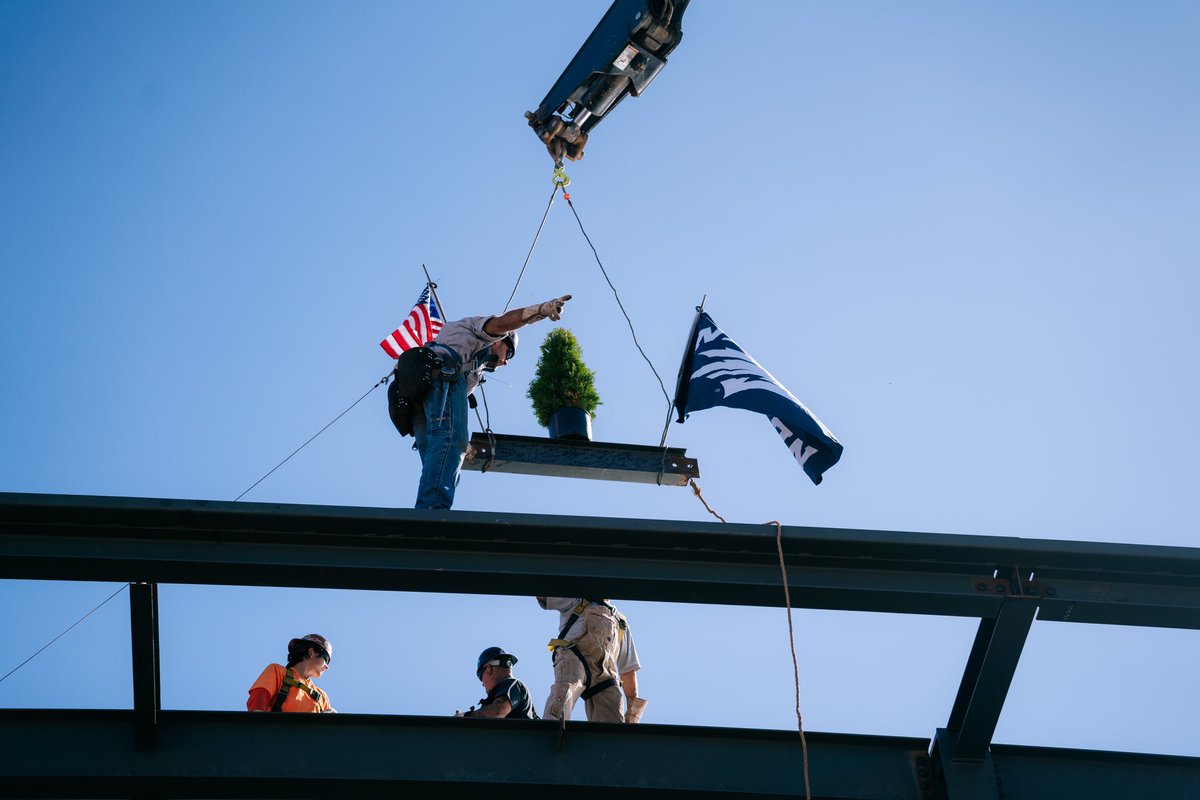 Stephanie_Rempe's tweet photo. Today we celebrated the “Topping Out” of the Eric &amp; Linda Lannes Basketball Building! 🏀 🌲 🐺 

Excited about the progress we are making — can’t wait for our teams to move in this summer! 

#NevadasCollegeTown | #BattleBorn https://t.co/Z6AFdCwalz