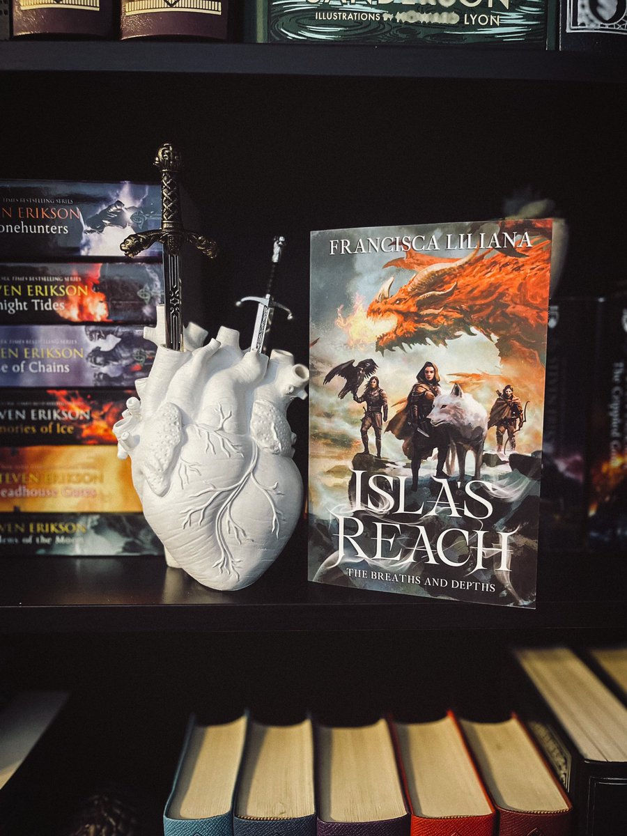 Hi. I write books about animal companion assassins, mad dragons, and therapeutic soup. Some people like it.