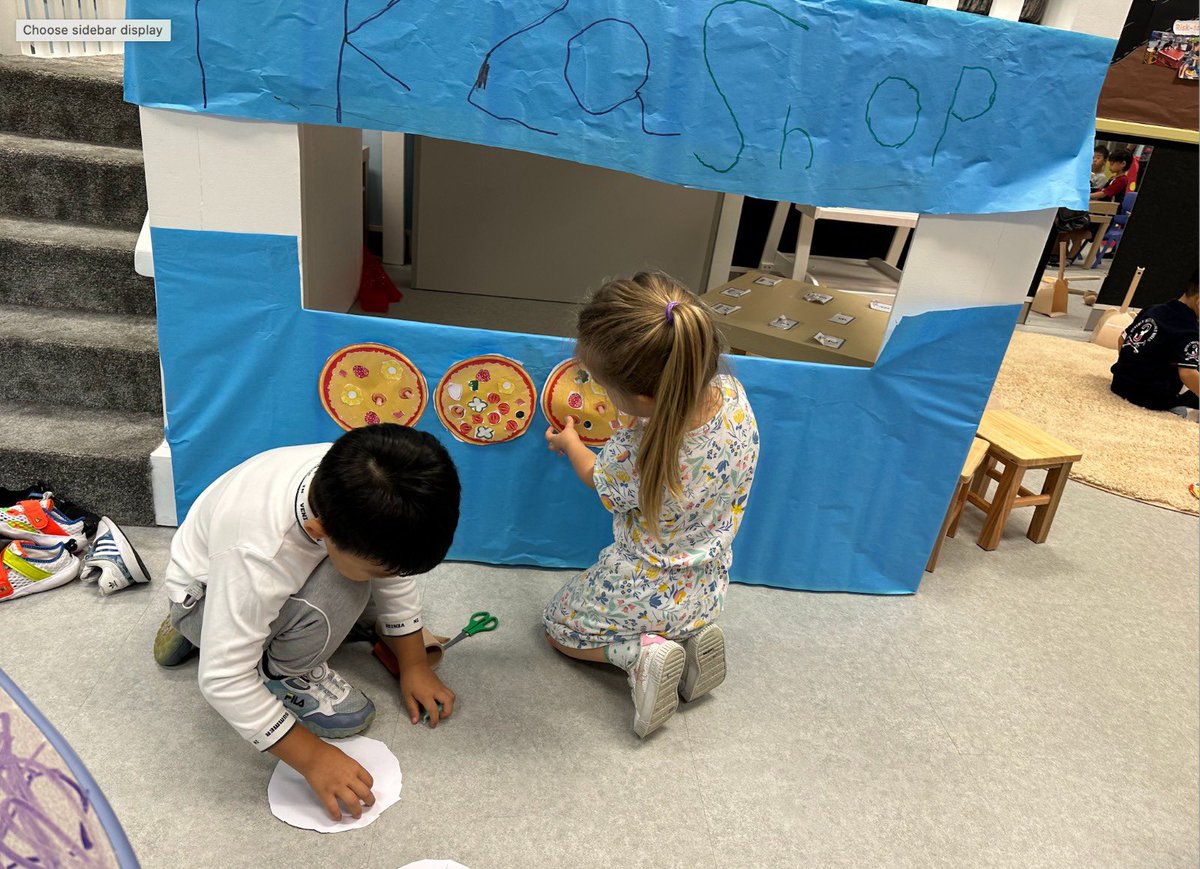 Our Pre-K kiddos are on fire! 🔥 They're exploring community helpers at the fire station, whipping up their own pizza shop with an oven, concocting mud cake recipes, and even designing their own fire truck! 🚒🍕🎂🚒🚒 #AISGZ