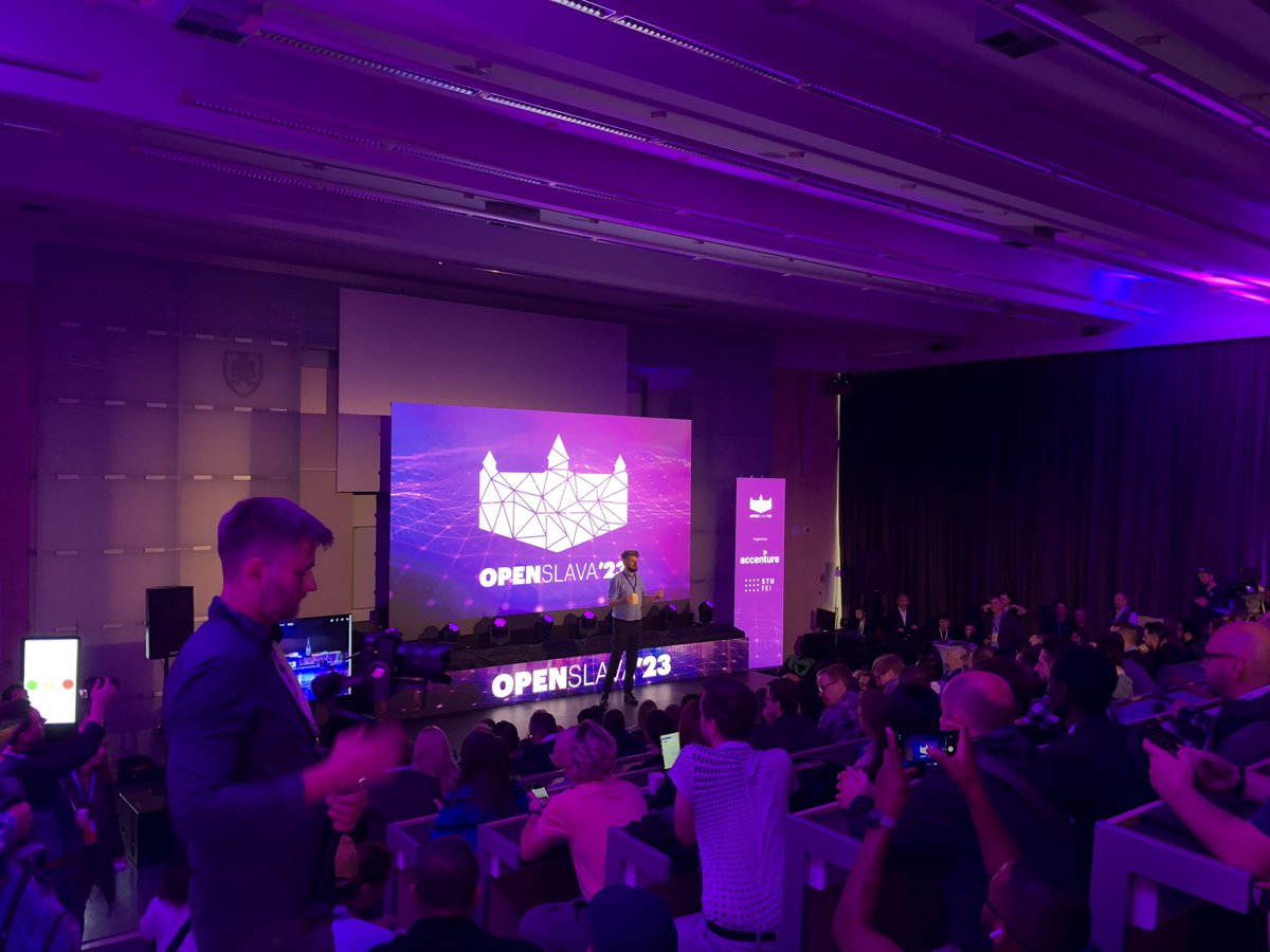 Pytlicek's tweet photo. #OpenSlava started with @jano_g , room is fully packed and mood is good. Looking forward to all talks they prepared for us. Big thanks goes to @Accenture who is organizing this awesome conference for 11 years 🥇👍🚀👏🙏 https://t.co/xBNOleicDW