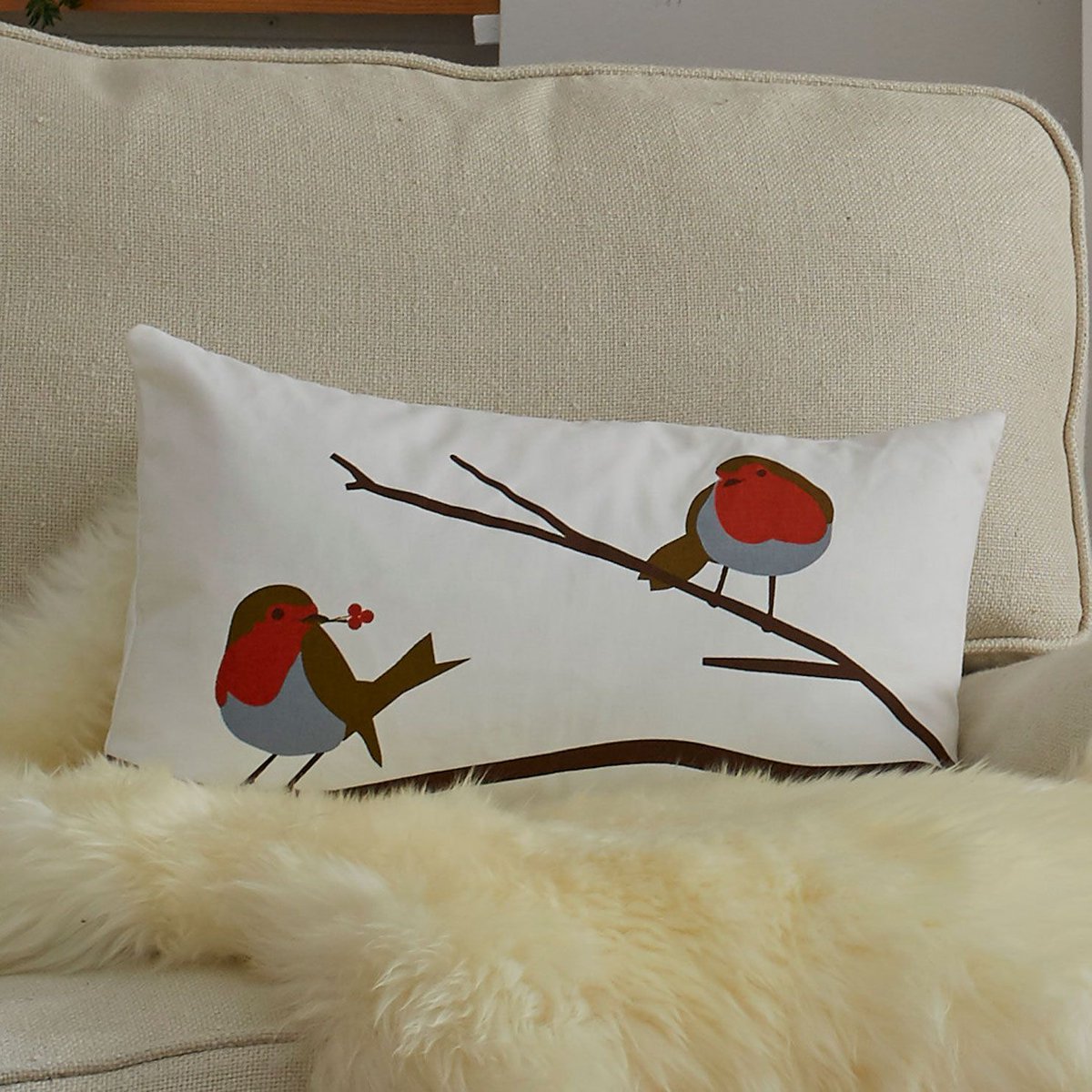 Christmas happens early when you run your own business but this year I feel like I've been really slow getting off the mark! We have the robin cushions back in stock for this year! 
They're a Lorna Syson classic, and my favourite shape for a neck rest of the sofa!