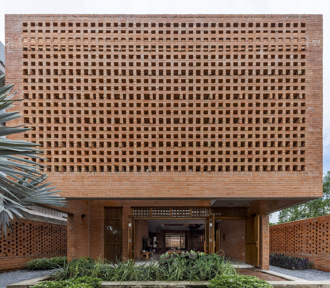 Open Rectangle Building The site features a long rectangle with five bedrooms, an open living ...