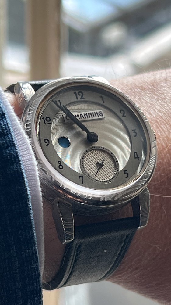 the_watchnerd's tweet image. Saw the debut watch from CMManning, the 21.01, recently, which combines the silversmithing, jewellery and horology skills from @Silver_hand into something quite different. Particularly like the thoughtful guilloché to the dial / sub-seconds #watchnerd #teamwatchnerd