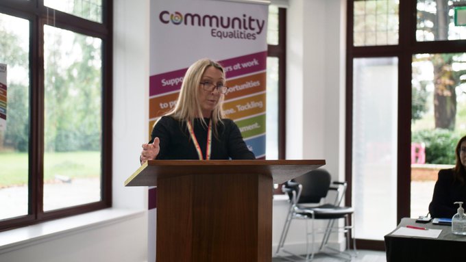 A photograph of Community's Head of Equalities, Jennifer Dean speaking at the 2023 Equalities Conference.