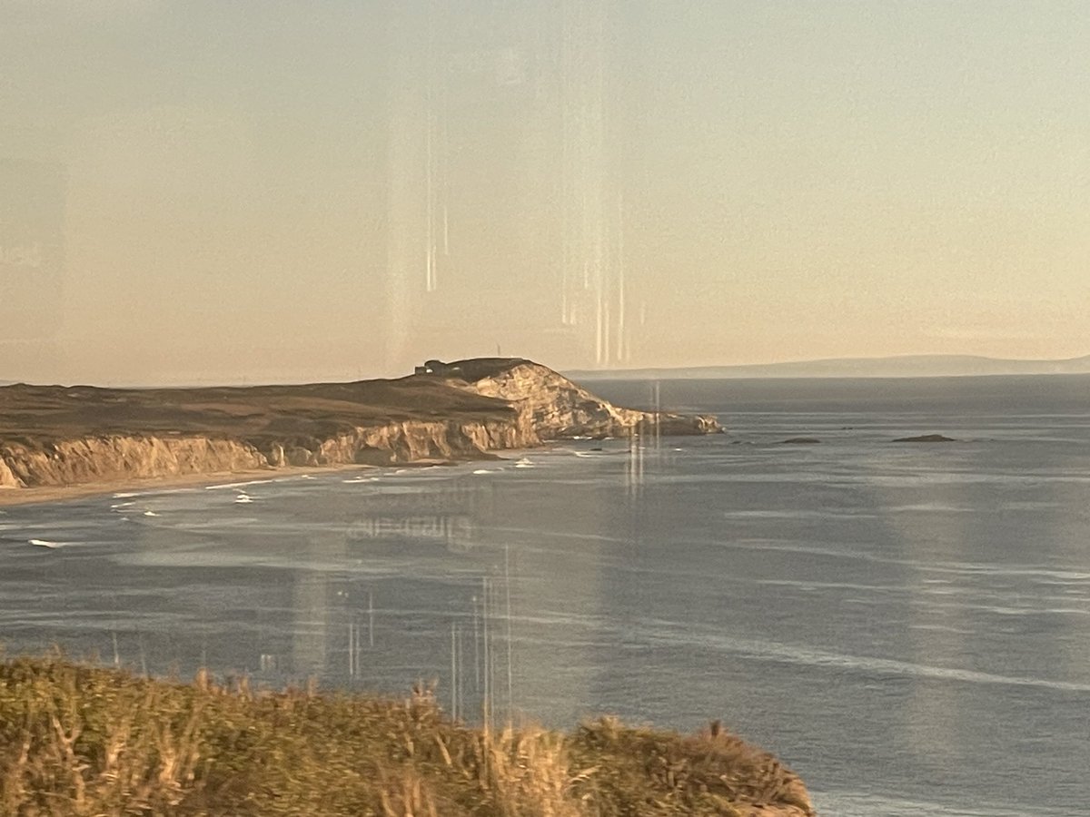 ShawnHymel's tweet photo. The views from the Coast Starlight along the California coast are amazing. Also, old telegraph poles! #HackerTrain https://t.co/f3ExB1r1Bl