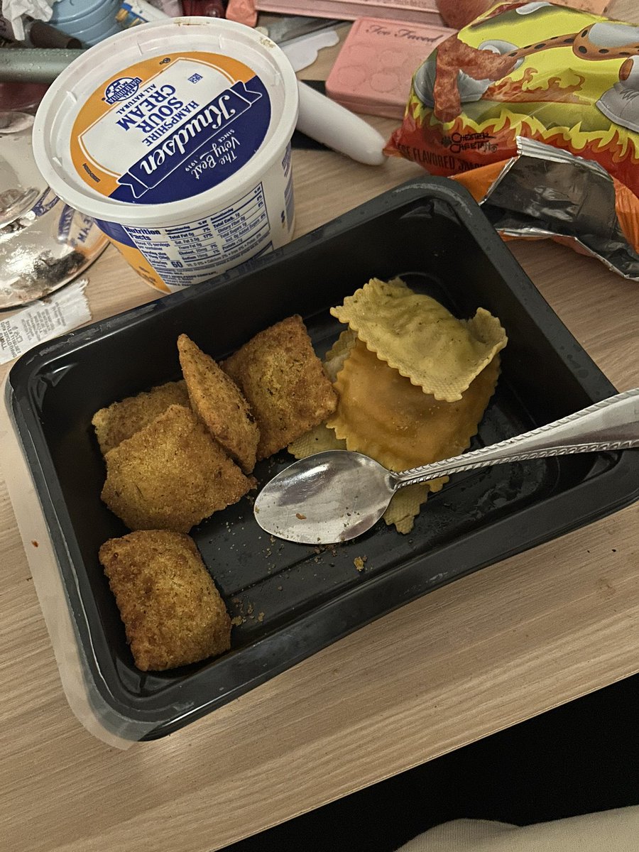 my girl dinner tonight. fried ravioli and regular ravioli (tomato and burrata stuffed ravioli from trader joe’s) and hot cheetos and sour cream idgaf