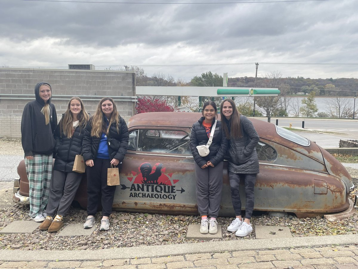 postma14's tweet photo. We made it to our first nights stay in Champaign, IL. We made a pit stop at Antique Archeology (American Pickers). We had to take a picture by the car.  We also had the good  fortune of having an awesome gentleman that checked us in to our hotel and gave us an AWESOME place toeat https://t.co/E8uAs3gVxm