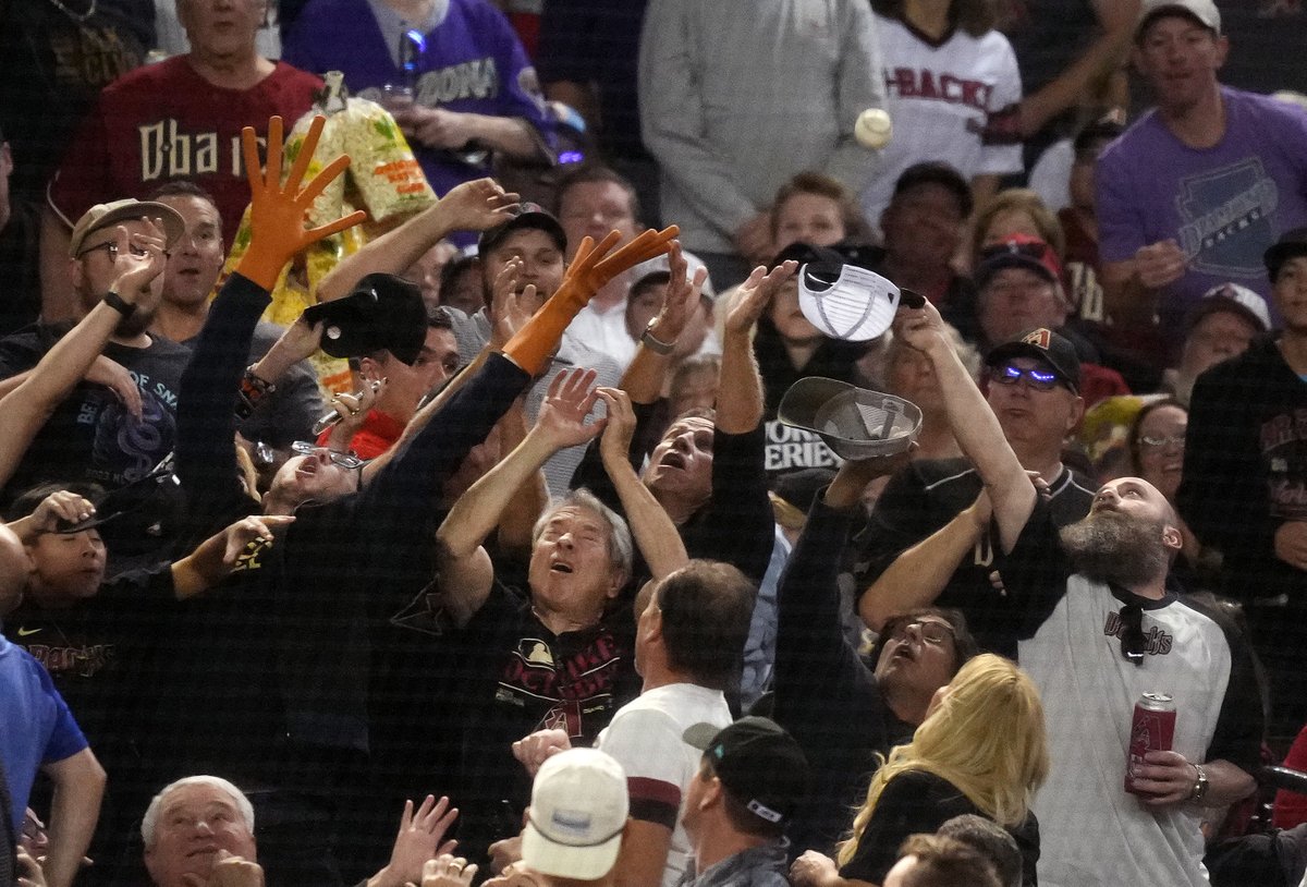 Yes the DBacks lost but forget about that and think about the man with hotdog fingers trying desperately to catch a foul ball: