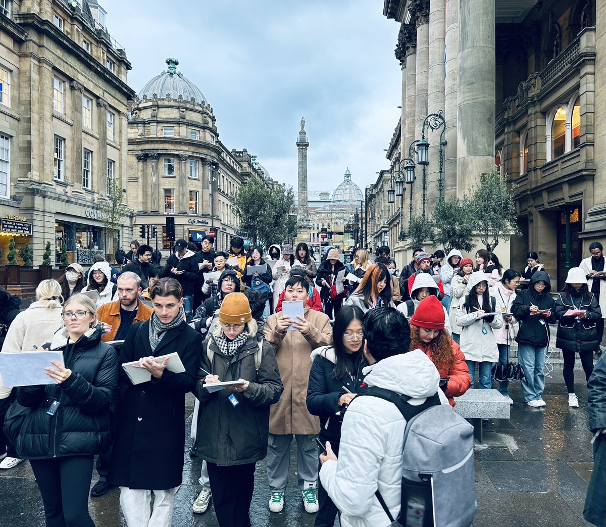 MUDLab_UoM's tweet photo. 75+ #urbandesign students sketching serial visions down Grey Street - not sure the lovely people of #Newcastle knew what to think of this! @MUDLab_UoM 2-day residential started great with lots of design exercises run by our own @design_pb and @rachel_kerr23 #UDIP https://t.co/ZURNNY3FjL