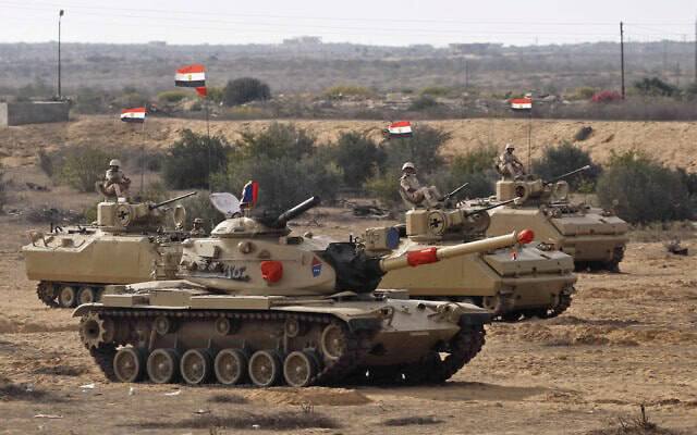 SprinterPress's tweet photo. Egypt has deployed armored vehicles on the border with Gaza. https://t.co/NJTyQu6ZYn