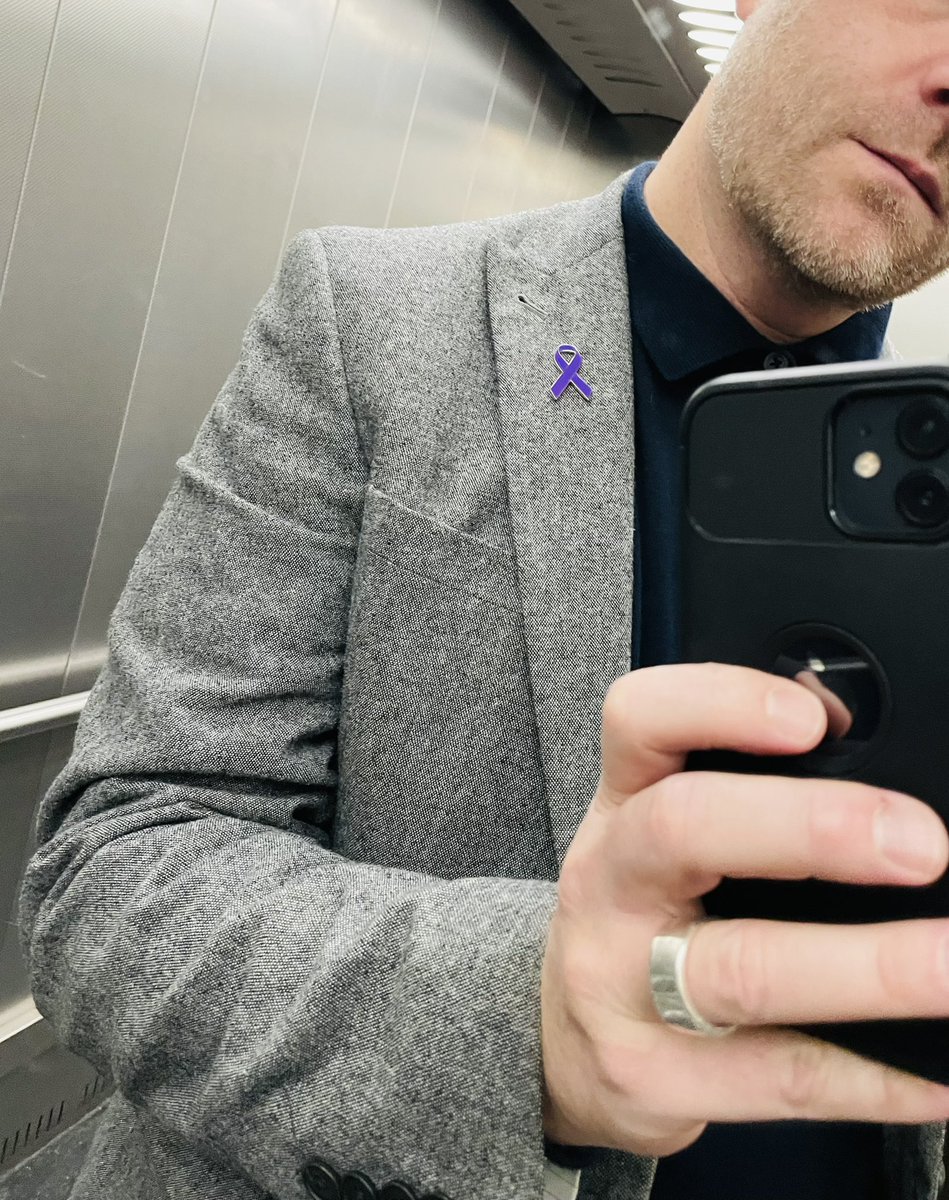 Pin badge on. 1st November marks the start of #PancreaticCancerAwarenessMonth for 2023. Over 12 years since we lost dad and progress is painfully slow. More needs to be done. A good place to start? KNOW THE SYMPTOMS! 💜