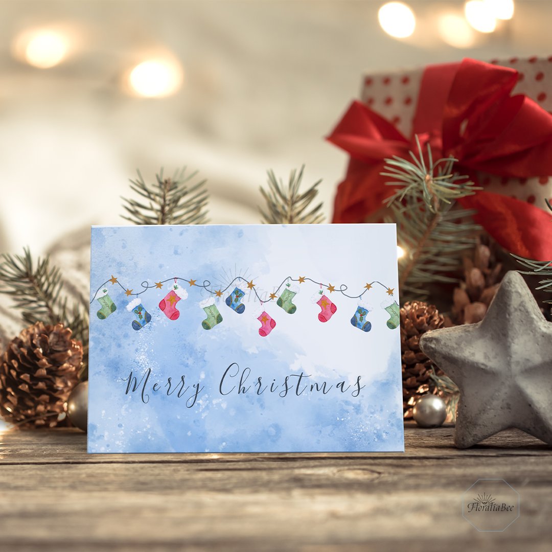 DsgnByChristina's tweet photo. Yes it's November, but I've been having so much fun designing this Festive Watercolour Hanging Stockings &amp; Stars Holiday Card

#Christmas2023 #HappyHolidays2023 #christmascards #watercolorillustrations

https://t.co/zmYNCYsmHo via @zazzle https://t.co/YcZJZjseaD