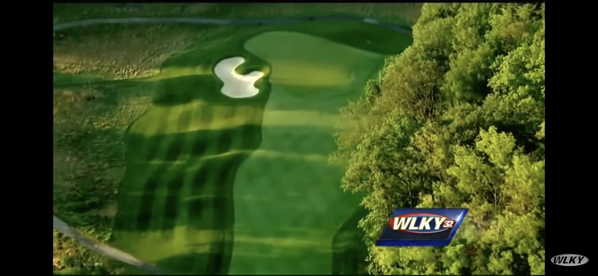 KYGolfHoles's tweet photo. #6 at Valhalla GC is aptly named The Bear both for its Nicklaus design and brute test of golf. The par 4 topping out at 490 yards doglegs right over the wide Floyd’s Fork, forcing the player to hit a an approach shot at a minimum distance of 185. The first shot club will vary from driver to iron depending on tee. Misses into the fescue likely require a layup second. The green welcomes shots along the ground and misses right. Par here is often earned by two good shots and still yet, an up and down.

#golf #golfcourse #golfcourses #golfcoursearchitecture #golfcoursephotos #golfcoursemaintenance #golfchat #golfaddict #kentucky

Credit: WLKY YouTube for overhead photos
