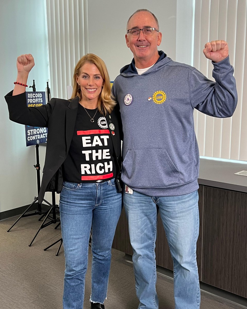 UAW's tweet photo. Double trouble (for the billionaire class)!

#UAW President Shawn Fain and AFA-CWA (the Association of Flight Attendants-CWA) President Sara Nelson embody solidarity across unions, and across sectors!
#StandUpUAW #PayUsOrChaos

@afacwa
@flyingwithsara
@shawnfainuaw https://t.co/GlLdgFuk7M