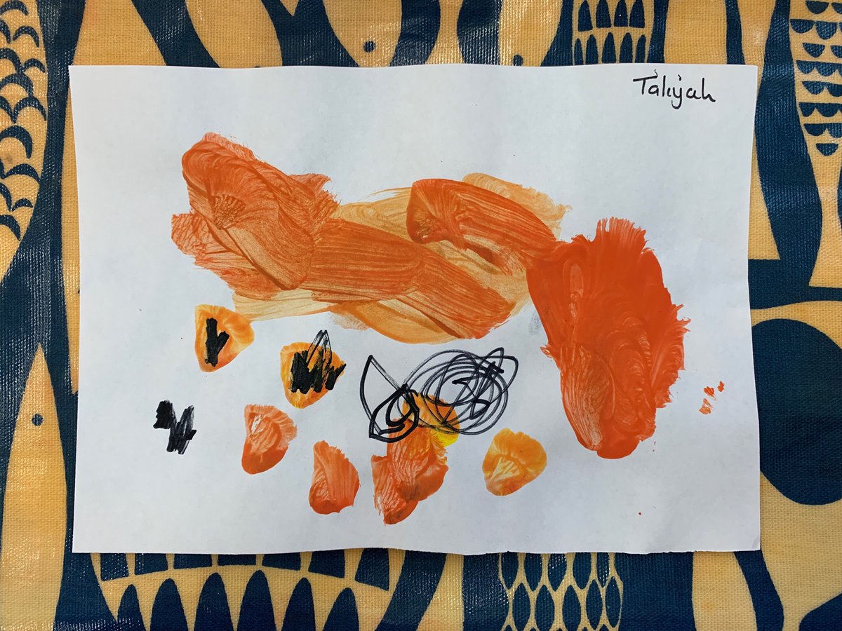 We mixed orange to paint pumpkins. We added faces to our pumpkins to make them Halloween-y!
