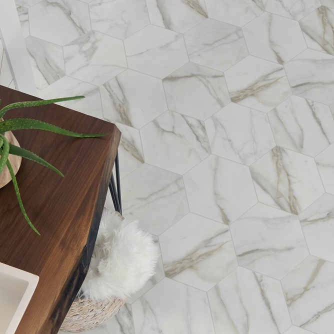 The realistic looks and variety of budget-friendly patterns of <a href="/ManningtonFloor/">Mannington Mills</a>'s sheet vinyl can bring new life into any room, especially high-moisture rooms like bathrooms, kitchens and laundry rooms. Flooring details: Carrara, Color: Pearl pbxx.it/RhUOOD