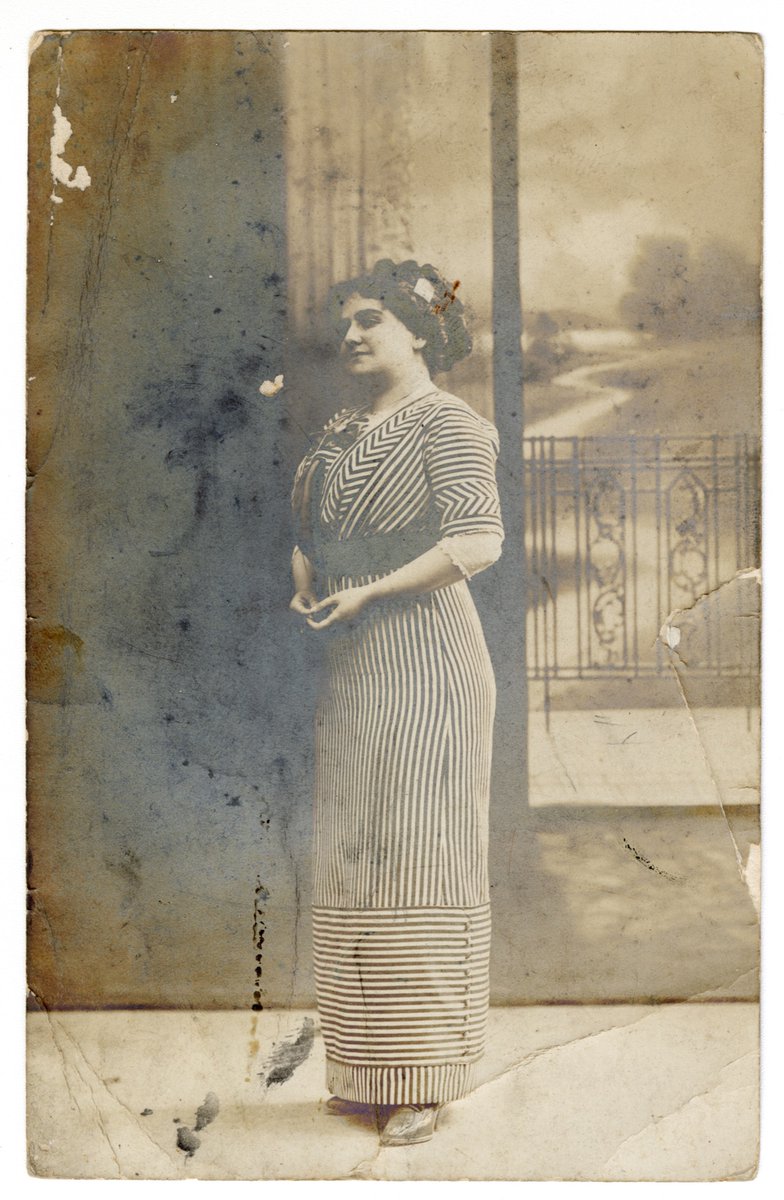 CofCSpecColl's tweet photo. Happy #FashionFriday! 

Fannie Strauss sent this postcard of herself posing in a fashionable striped dress to H. Pearlstine in 1911. The back of the card reads "Just to show that I am still alive." https://t.co/QVflhY2uHP