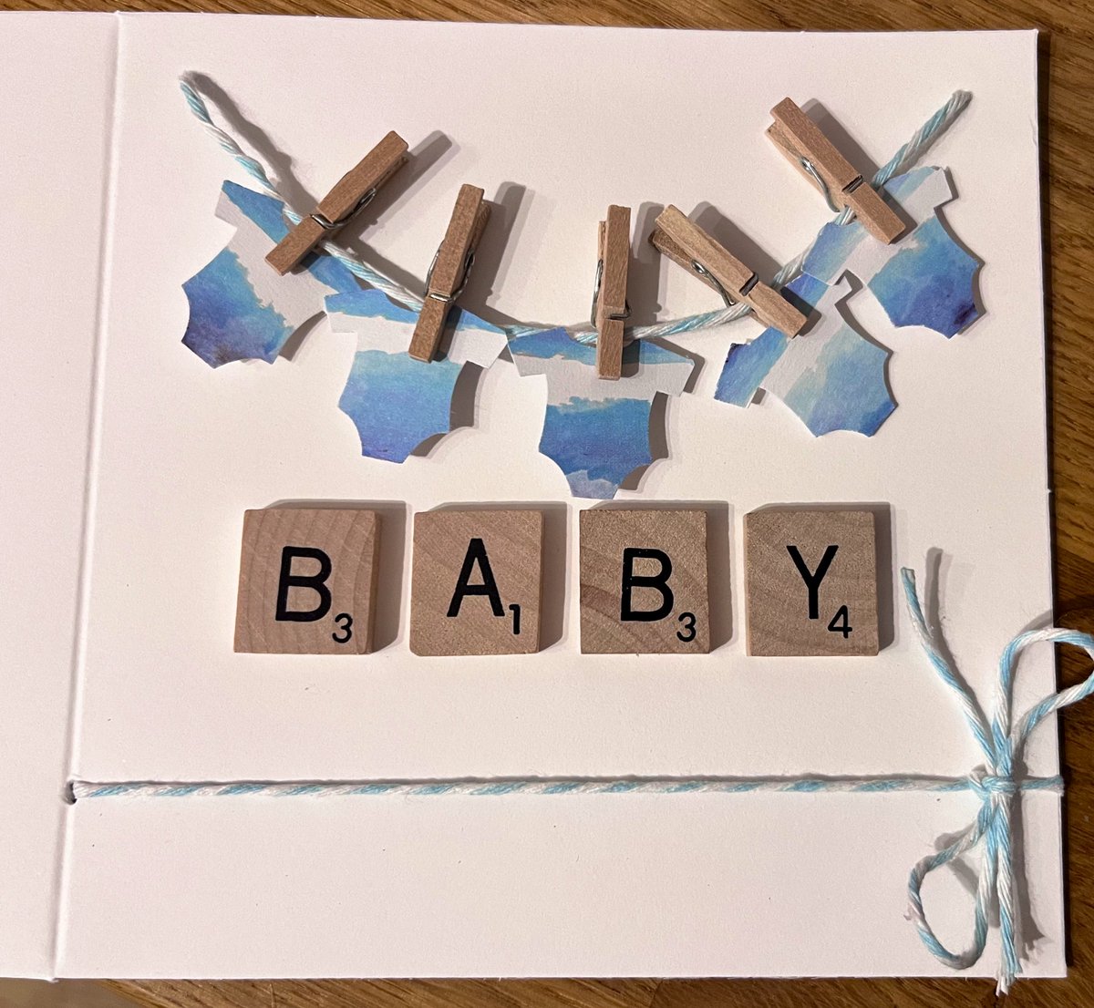 A special card and gift made for a new arrival. 🍼🧸🩵💙🤍 #babygift #pebbleart