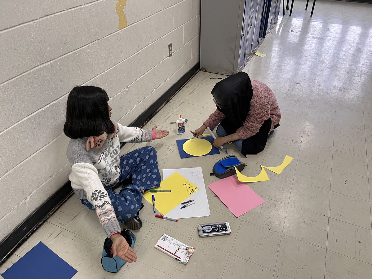 Students working on their intergers board games.