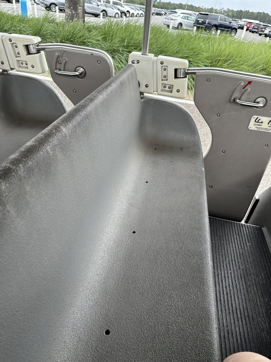 commanderpuck's tweet photo. Look at this gross parking tram seat from Disney World…@WDWNT y’all need to set the dogs on this one… it’s nasty.  They sat for 3 years unused, and it looks like it.  They couldn’t be bothered to bleach or power wash them or something before returning them to service? https://t.co/aeexsVqc5E