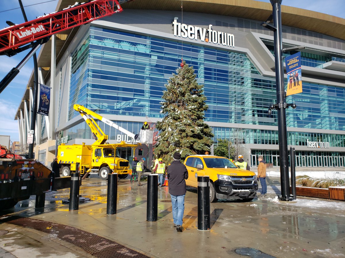 Before dawn I joined city foresters as they harvested the official city Christmas Tree. Denise Blue donated the 38 foot beauty which will be decorated and lit with holiday lights on November 17th at  Deer District -- or 'Cheer' District as we're calling it.