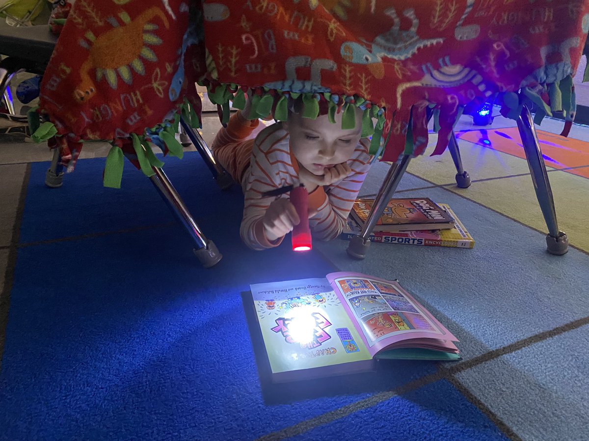 PJ day, fort building, and flashlight reading for the win on the day after Halloween!