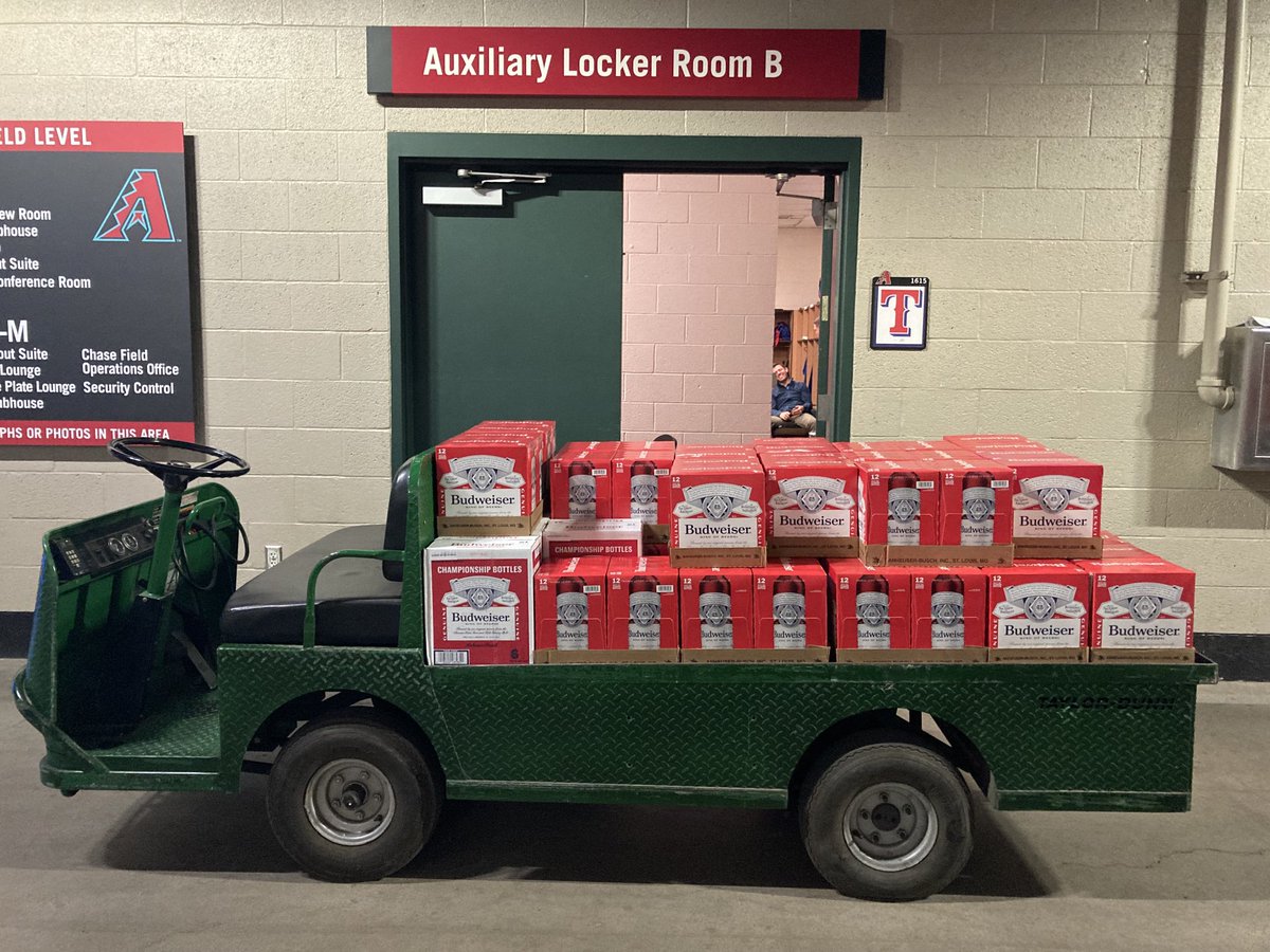 They appear to be loading the celebratory Budweiser into the Texas clubhouse in case of a Texas win #ProtectTheCarpet