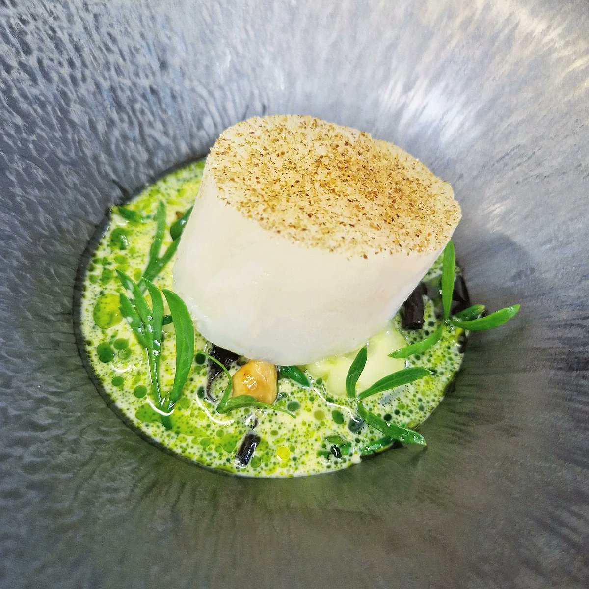Cod / black trumpet / hazelnut / cider Confit cod, black trumpet mushrooms, pickled hazelnuts & cider normande, split with parsley oil & sauce served tableside. • #passionate #chefs #brigade #foodies #cookery #foodgloriousfood #ingredients #textures #chefslife #saucenormande
