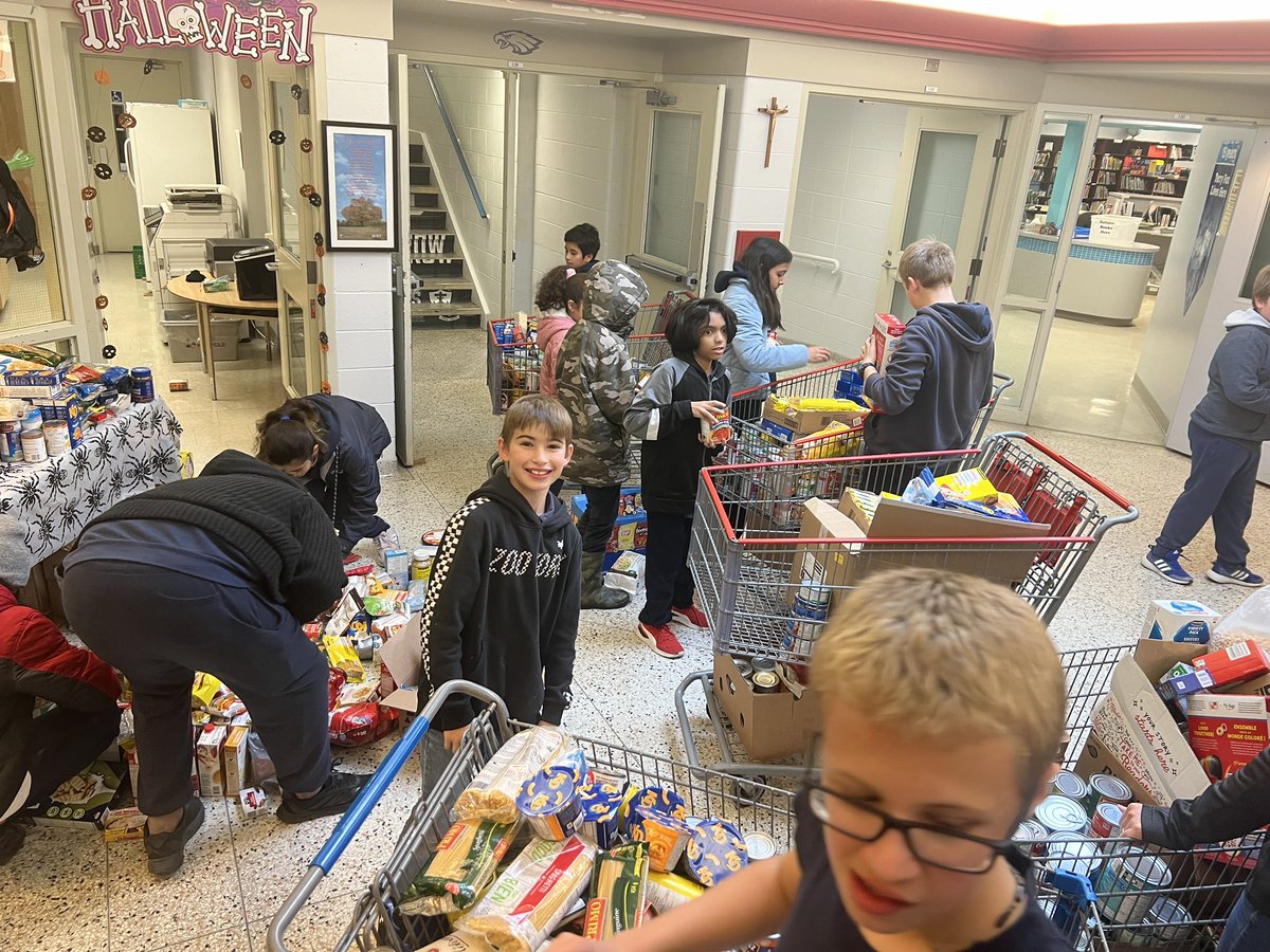 Today’s math problem. How do you fit 2000 canned goods into 5 shopping carts? #fooddrive <a href="/niagaracatholic/">Niagara Catholic DSB</a>