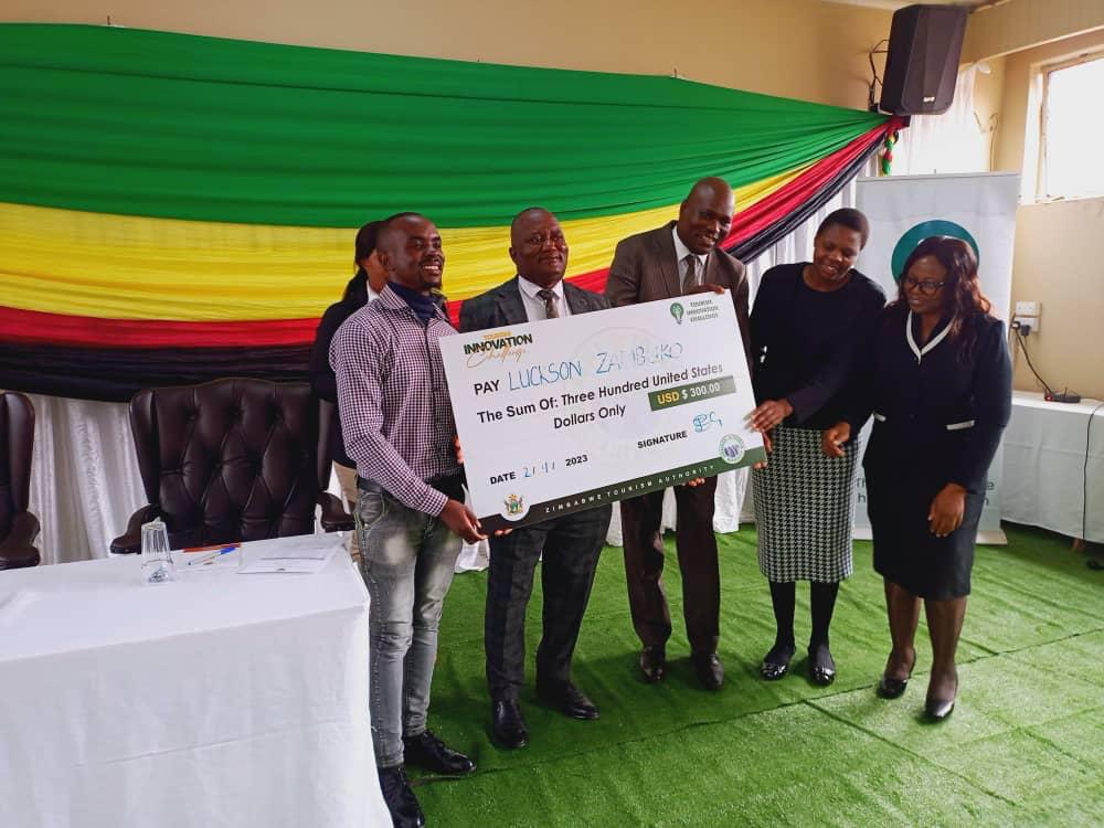 ZtaUpdates's tweet photo. CONGRATULATIONS, MAKOROKOTO, AMHLOPHE to Leslie Mafuta who was represented by his Father for winning the Masvingo Province Tourism Innovation Challenge prize & to the 1st Runner-Up Jubilee Sibanda ,Rumbidzai Mutangudura & the 2nd Runner -Up Luckson Zambuko! The event was graced by the presence of the Minister of State for Provincial Affairs and Devolution Hon.E.R Chadzamira(MP) who was accompanied by the Secretary for Provincial Affairs and Devolution-Masvingo Province, Dr A.Pazvakavambwa.

#VisitZimbabwe 
#ZimBho
#SustainableTourism 
#InnovationChallenge
