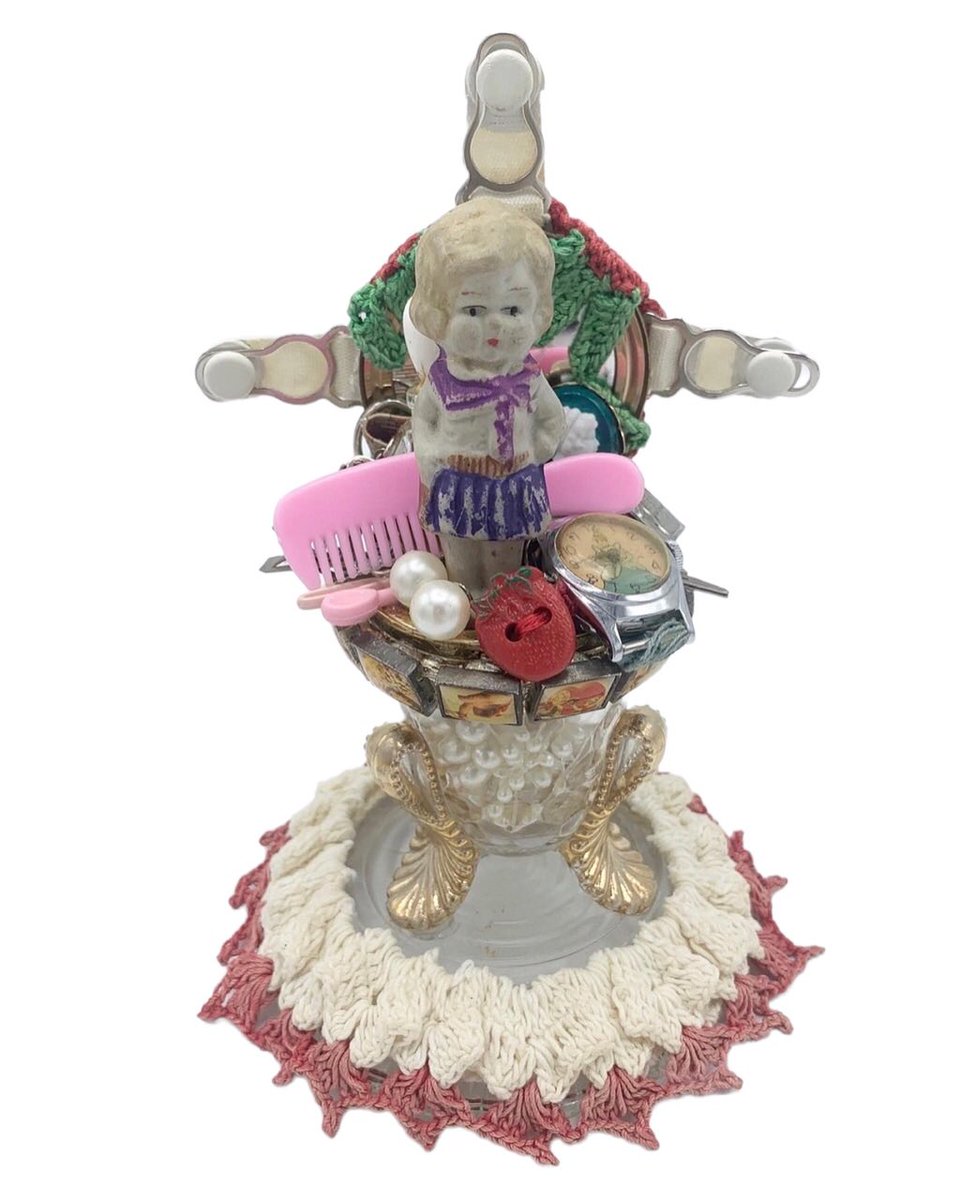 Fresh from the studio……revision to:

More Beautiful Than You Imagine

7 x 5 x 5
Narrative Found Object Assemblage Sculpture

I finally made some additions and now I am very happy with it. The garter hooks feel like a halo, a crown, or celebration! Do you re-work “finished” work