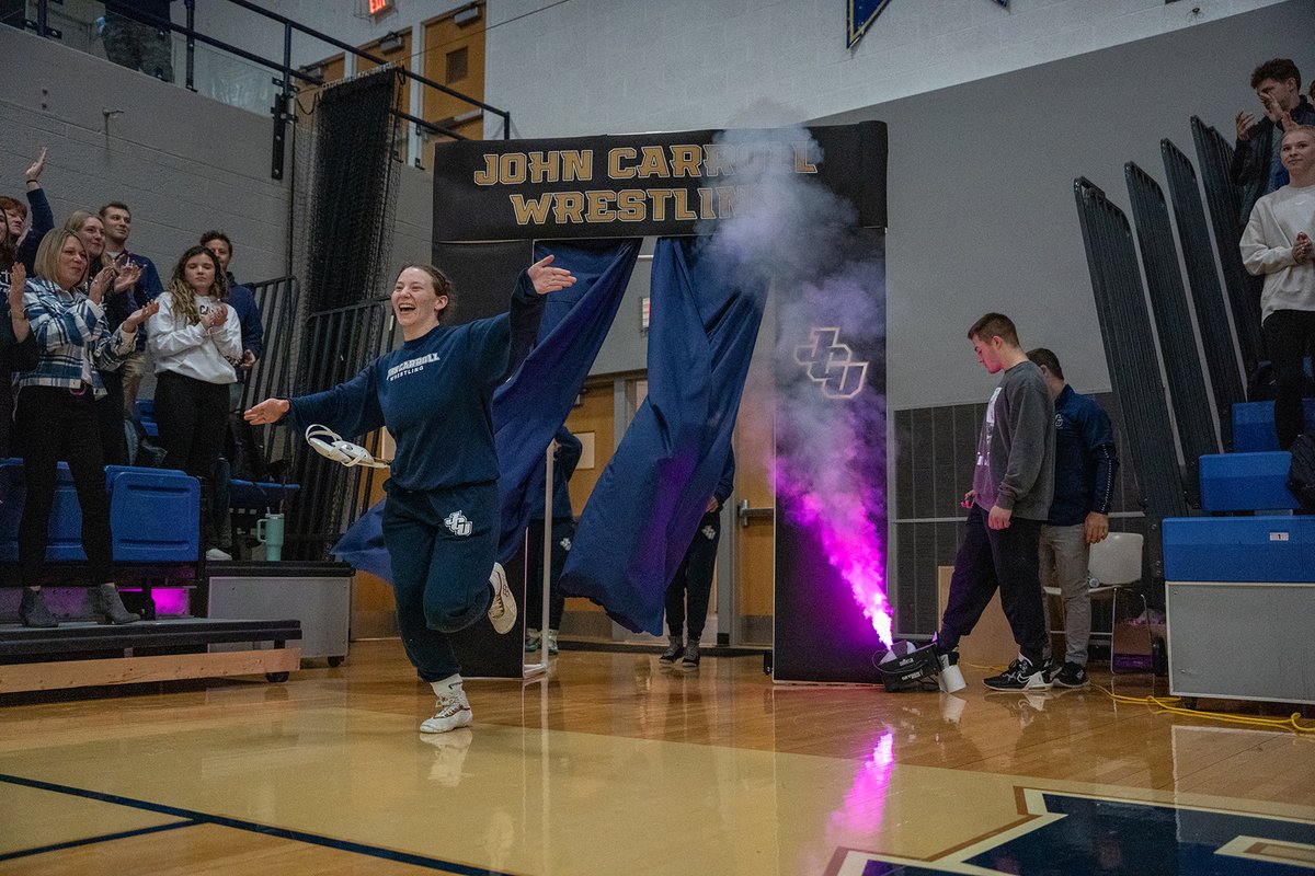 JohnCarrollU's tweet photo. It was a historic evening in the DeCarlo Center last night as the Women's Wrestling team made its debut! Congratulations to our Blue Streaks on their inaugural match, and thank you to the energetic crowd who came to support our athletes! https://t.co/h9IFWxahkl