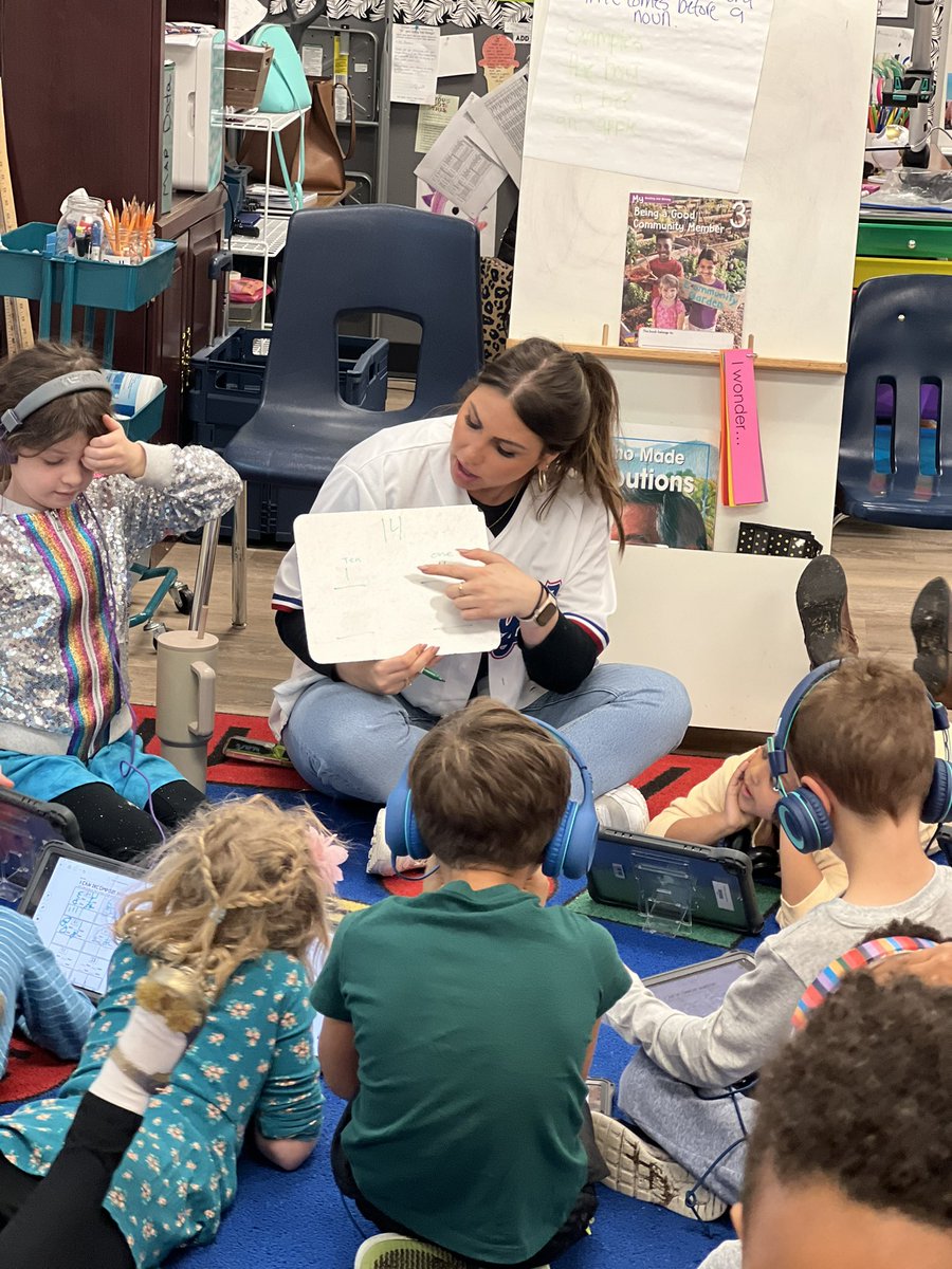 Torie41830356's tweet photo. When you’re already working with a small group and the best SPED teacher in the world is in your room, sees your class struggling with regrouping, and decides to help THEM ALL! It takes a village and I love my village 💛💚 @Ms__Dallas #RISDWeAreOne #risdbelieves https://t.co/h9OsuAmRdy