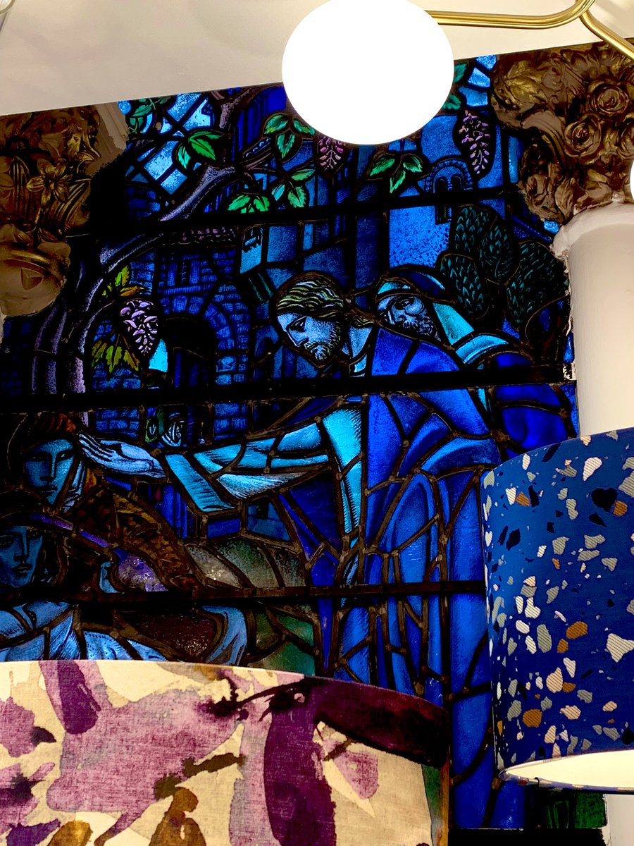 jeelyeater1's tweet photo. Thanks to @adbrora for telling me about a #repurposedchurch in Edinburgh, in which there’s some #StainedGlass. It’s now a lightning store, so a #DouglasStrachan window is hard to see, as it’s obscured by lampshades. Don’t know who designed the other window. https://t.co/ARqrITajoA