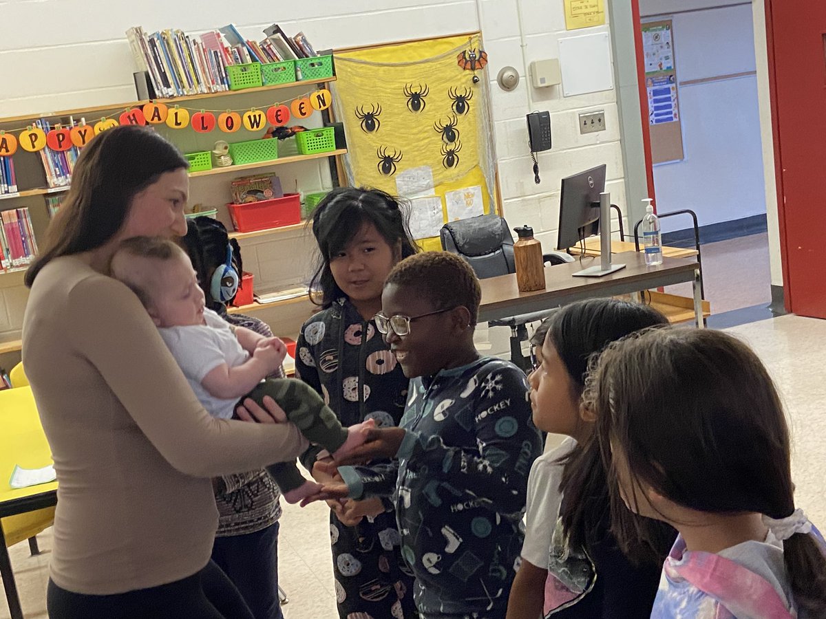 RootsofEmpathy's tweet photo. This @StLawrenceTCDSB classroom in #Toronto, #Ontario, had a little visit from their 'Tiny Teacher' Baby Rocco!

Touch, such as touching the baby's feet is so important in building empathy and emotional connections.

“Touch talks. Touch tells you anything a person needs to know and all you need to know in life is that you are loved, you are safe, and you are brave.” - @MaryGordonROE

@TCDSB_PAguiar