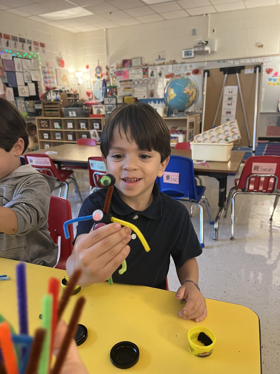 Our little monsters made their own monster buddies using playdoh, google eyes, and chenille stems! #finemotor #creativity @FCS_PreK