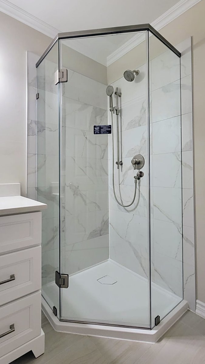 DoorsandMore's tweet photo. Neo-angle shaped showers are a great solution for small bathrooms. Their unique shape takes up less of a footprint than a traditional L shaped corner shower. The sticker on the door signifies the application of our glass protectant Enduro Shield, which is warrantied for 10 years. https://t.co/EGL02fXQUx