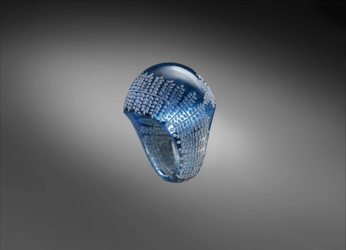 Blue glass ring by René Lalique, French, c. 1931.