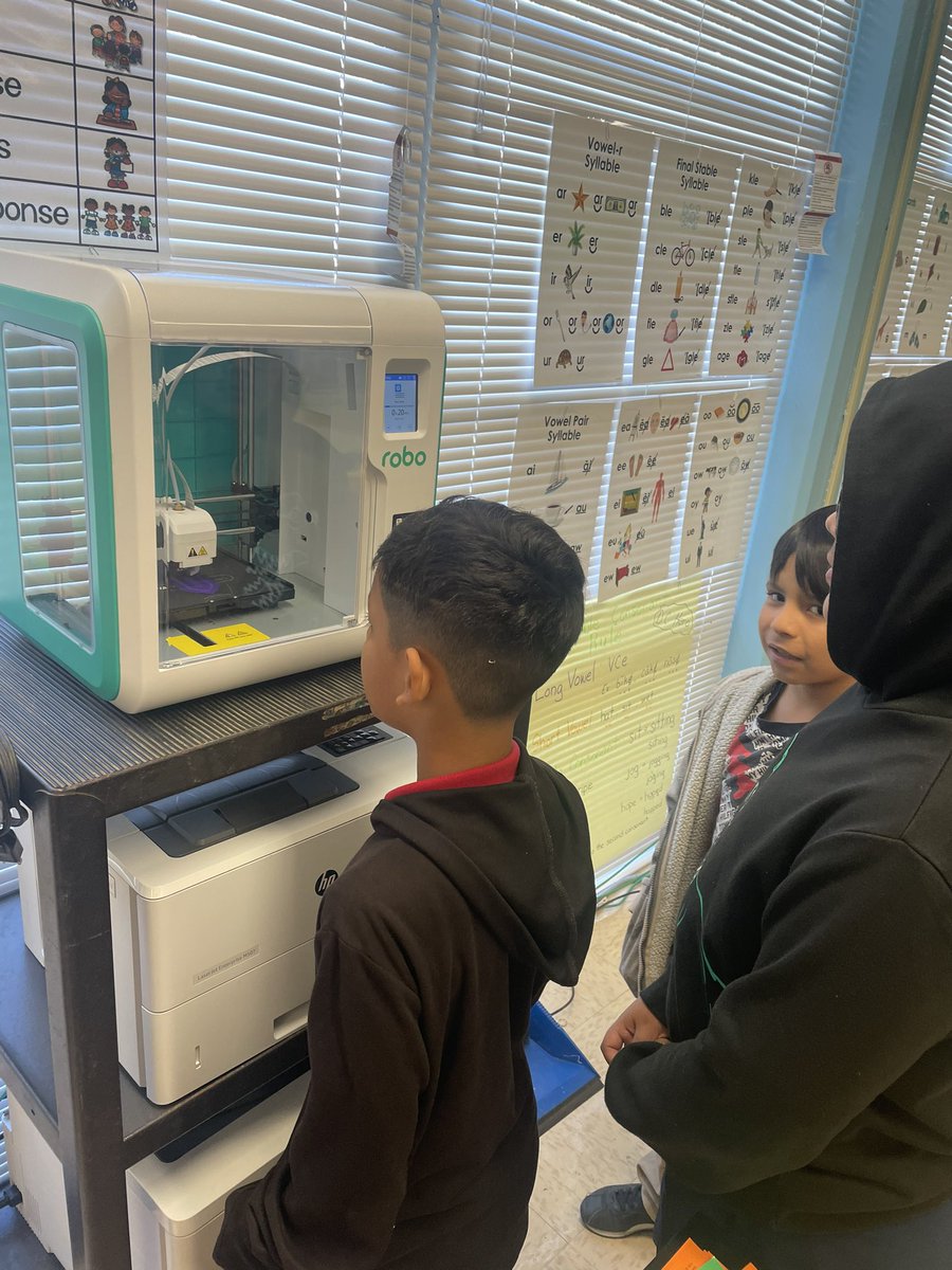 SSBoettcher's tweet photo. Shout out to my amazing Library Services Specialist, Robin, for coming out to help get Elrod started with our 3D printer. Our scholars were thrilled to see it in action! Started with some space themed bookmarks in preparation for Literacy Night! @HISDLibraryServ @mdhutchins26 https://t.co/pRL3rTfXlB