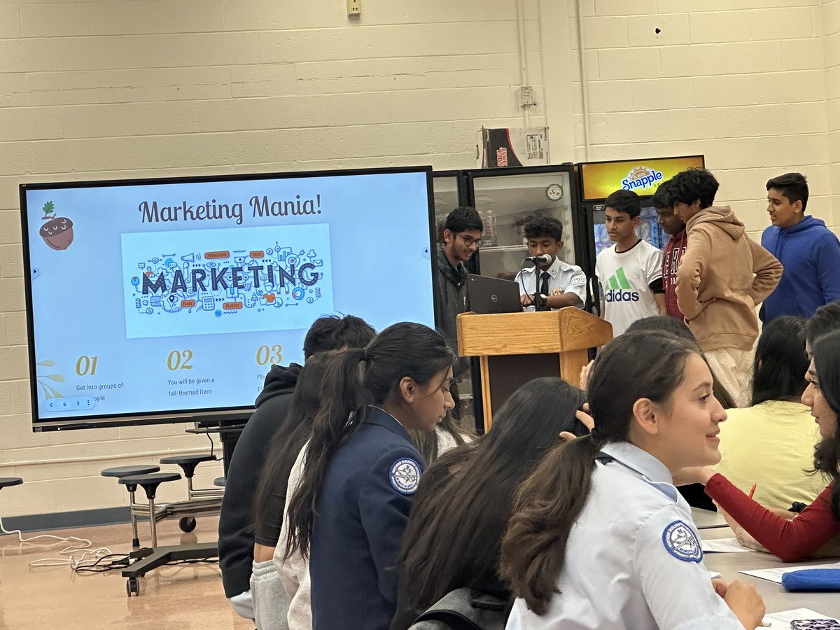 NBC_DECA's tweet photo. At todayβs meeting, NB DECA got to practice their marketing skills with an activity similar to one the officers participated in at #DECACOLT. Group were given various funny fall themed items to market to the rest of the group. Amazing work everyone! ππ https://t.co/266TSCmHjD