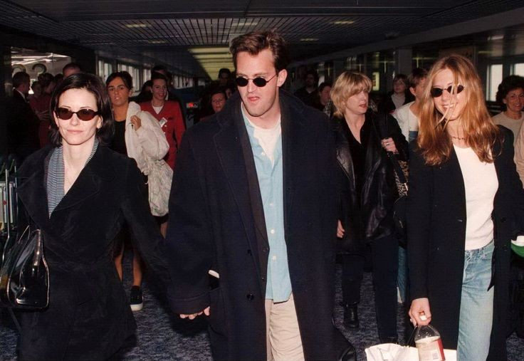 Courteney Cox, Matthew Perry and Jennifer Aniston land at London Heathrow Airport to shoot the episodes for Ross and Emily's Wedding in 1998.