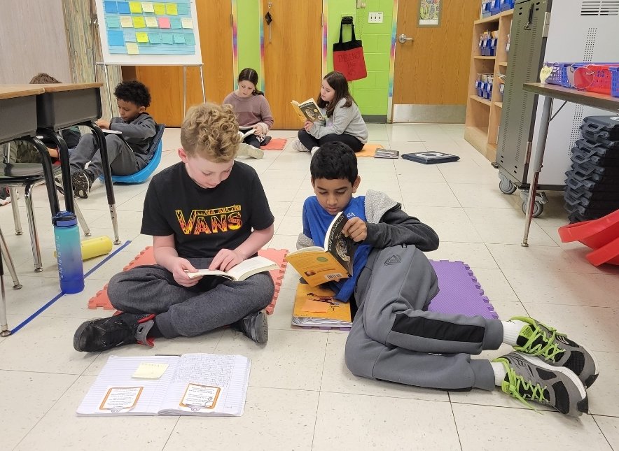 msmaresca's tweet photo. 4th grade readers are deeply immersed in the journey of a shared novel. Their conversations are like music to my ears! 💙📚 https://t.co/PBkBZwuxwP