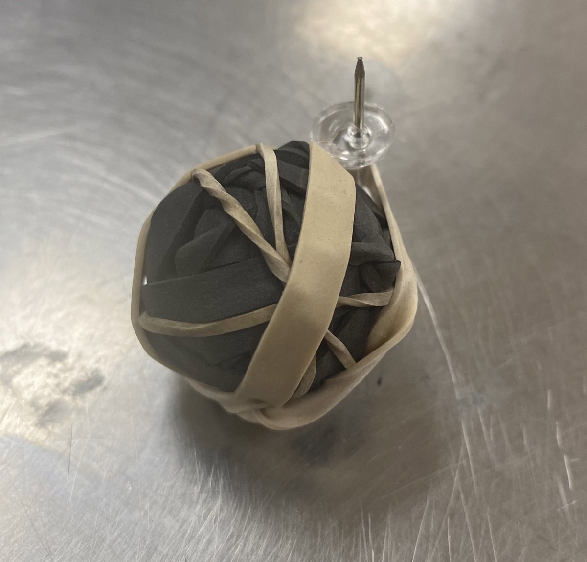 Reina_Izzy's tweet photo. Someone stole my first rubber band ball. I had to start over I left this one with a weapon to defend him self if they try and come again!!  Not going to lie I was so sad when I noticed he was gone. 🥹 https://t.co/uglg8c94kL