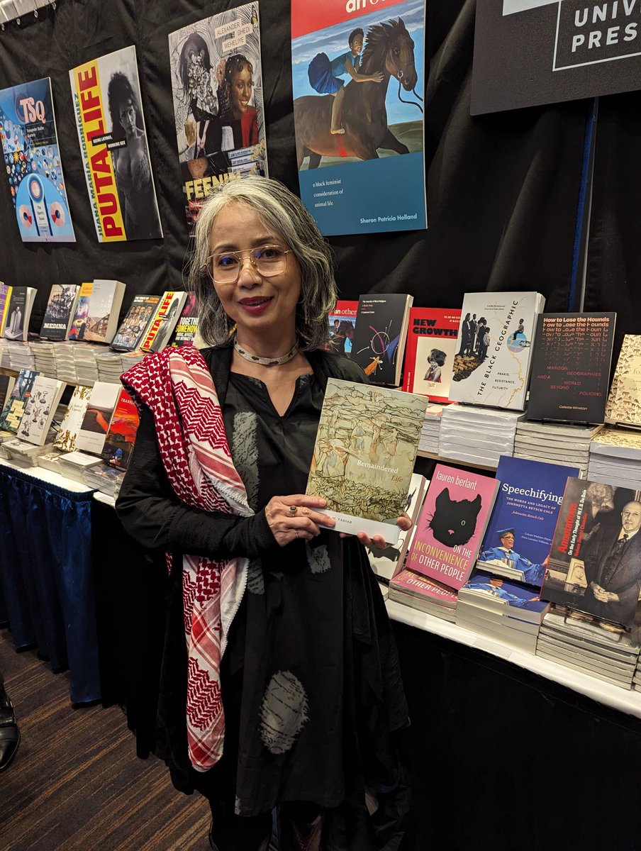 DukePress's tweet image. John Hope Franklin award winner Neferti Tadiar holds her book Remaindered Life 
 #2023asa