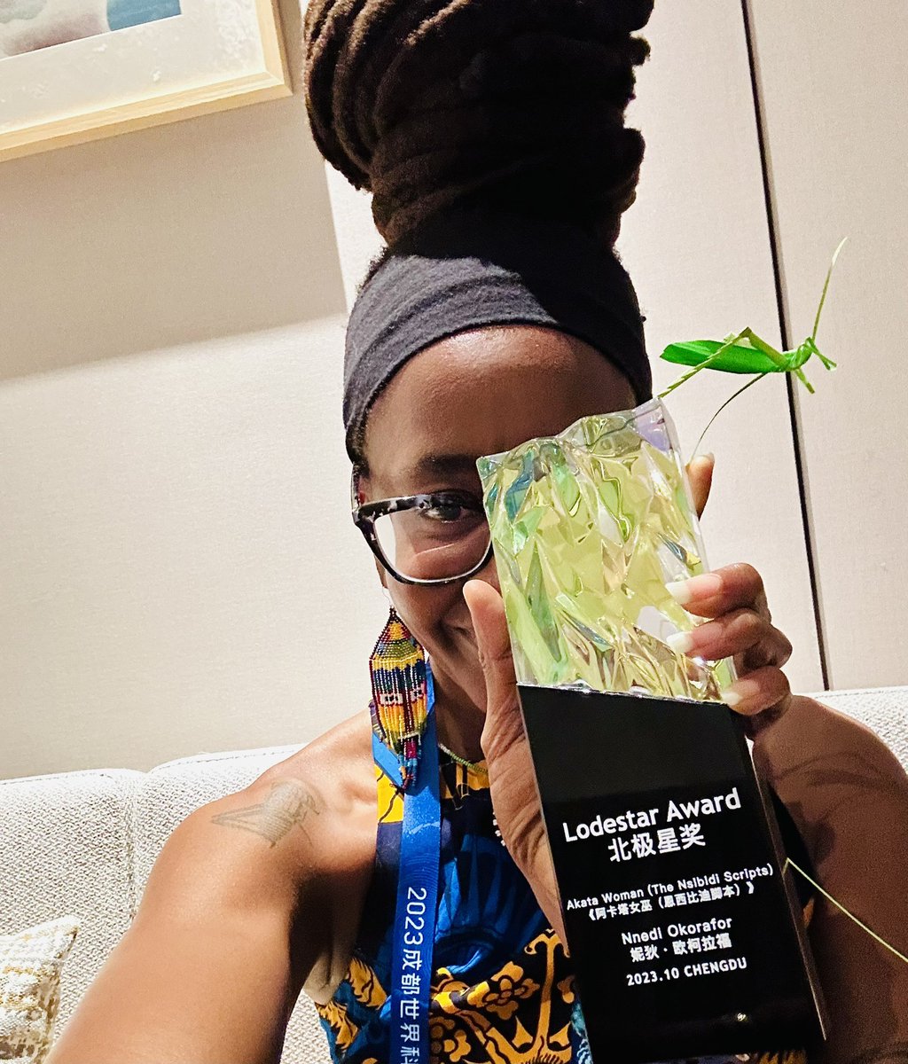 Nnedi's tweet photo. My novel AKATA WOMAN won the 2023 Lodestar Award for Best Young Adult Book! It was presented last night at the Hugo Awards in Chengdu (my 1st time in China!). 🥹!

Akata Warrior won it in 2018, so this is a big win for The Nsibidi Scripts series! 🇳🇬 #HugoAwards #ChengduWorldcon https://t.co/eJ5MWysLEc