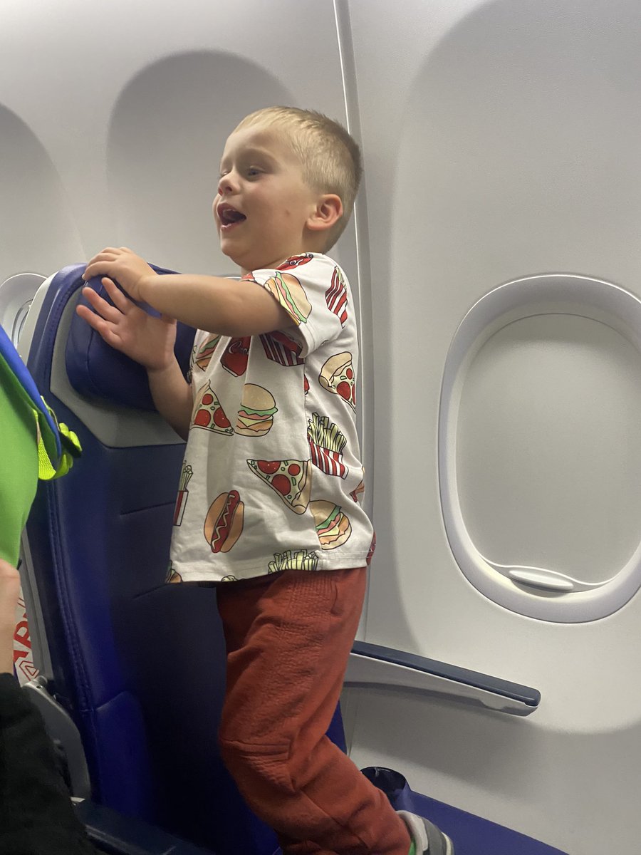 whittyt's tweet photo. @SouthwestAir Guess who’s back, back again…it’s the #snackmonster  ! Today he was feelin more like burgers&amp;fries but still asked the Captain if he needed a Co-pilot  but “IDK I just really love snacks” #HanginwMrCooper #Auntventures #Southwestairlines https://t.co/q8oGxGlAiT