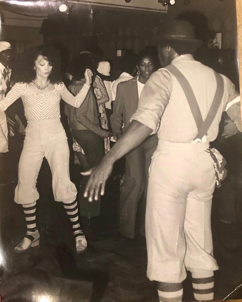 Toni_Basil's tweet photo. I’m so grateful to have this picture from the early #70s of #GregCampbellockJr. and #SlimtheRobot (peaking around the corner) at the club called ‘#TheApartment’ on Exposition and Crenshaw, after one of #TheLockers television performances. https://t.co/mSZbJ7RERV