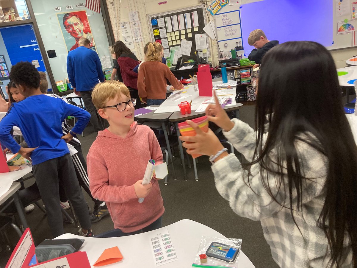 1 of 4 
Paugstat Place Market in full swing with Mrs. Doll’s homeroom!  #Economics 
<a href="/Coach_KT/">KT</a> @Adena_AP