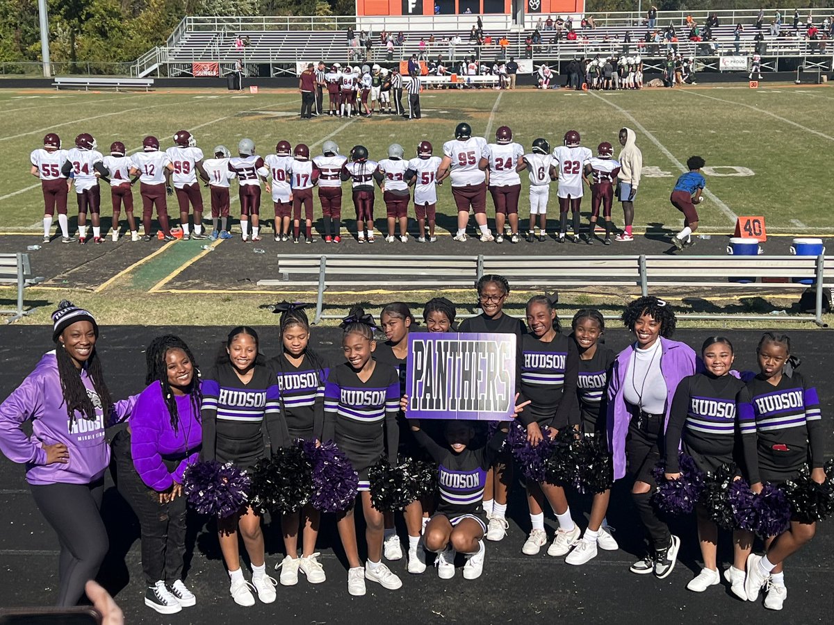 mssaxton's tweet photo. We’re so proud of our Panthers football team for making it to the playoffs!! Shout out to the cheerleaders for hyping up the crowd and cheering on our boys 💜🤍🖤  @HudsonMiddleS https://t.co/nbKlPHOICH